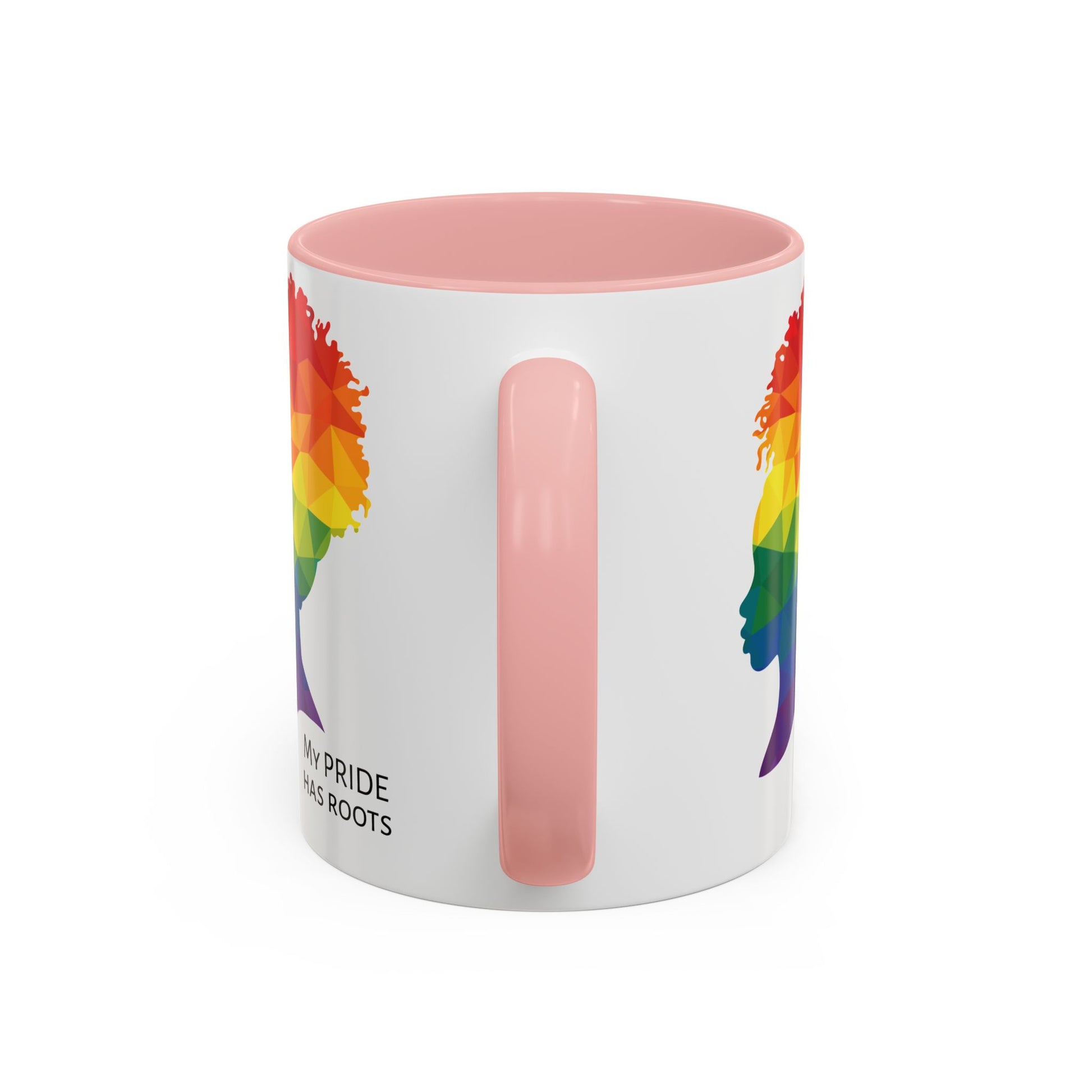 A white mug with a pink handle and rim, featuring a vibrant geometric silhouette of a womans head with a rainbow afro and MY PRIDE HAS ROOTS below—perfect for the LGBTQ community from The Worldwide PRIDE Store.