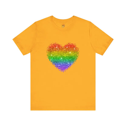 A yellow t-shirt with a glitter rainbow heart design.